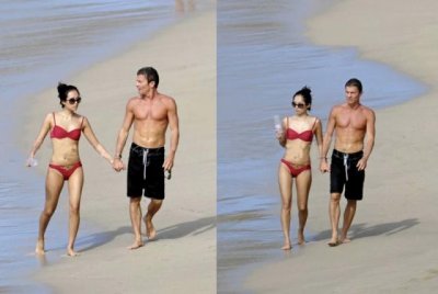 ​章子怡沙滩照与外国男友不雅行为 两人亲密晒日光浴旁若无人